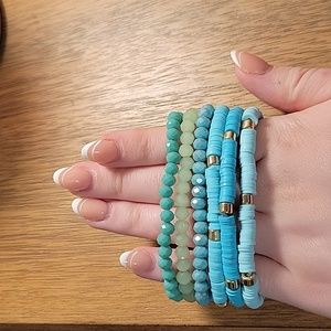 Set of beaded and heishi style bracelets in blue shades. 6 total